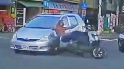 Moped Driver Turns too Late and gets Nailed by a Car