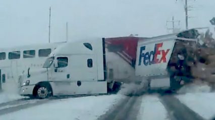 Train Crashes into a Fed Ex SEMI Truck! That is Where Your Missing Packages Went!