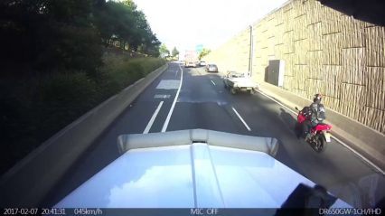 Distracted Motorcycle Rider Lands in the Bed of a Truck