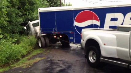 Ford F350 Powerstroke Pulling Stuck Tractor Trailer Out of Danger