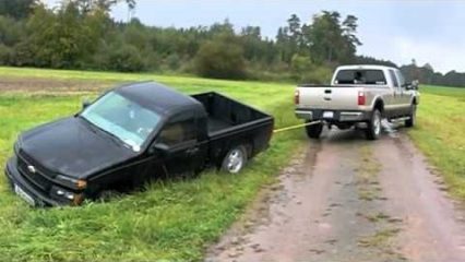 Ford F-350 Pulling out Stuck Chevy Truck