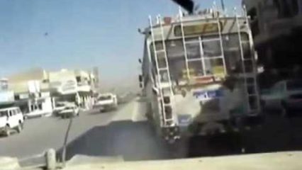 US Army Humvee Drives Through Traffic in the Middle East How We Wish We Could!