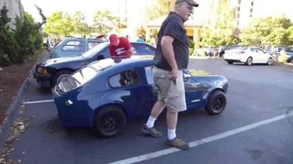 Big Men in Little Cars – This Looks Incredibly Uncomfortable