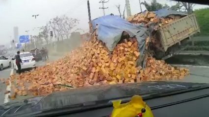 Brick Truck Flattens Car – Passengers Miraculously Saved