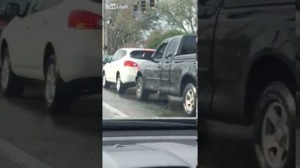 Guy punches a windshield and pepper sprays Ford Driver