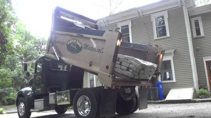 How Not to Unload Rock From a Dump Truck