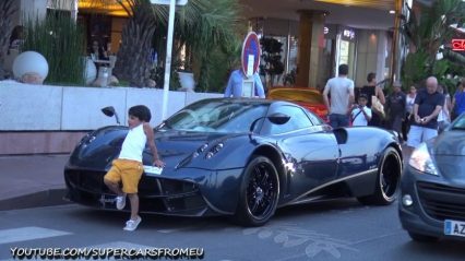 Kid Takes Photo-Op Too Far, Props on Pagani Huayra to Have Picture Taken!!