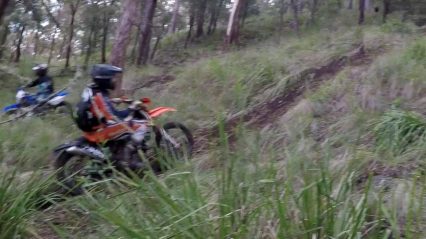 Falling Rock Takes Down Dirt Biker Trying To Race Up a Hill