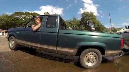Guy Gets Truck Stuck on Boat Ramp and His Buddies Try To Pull it Out By Hand!