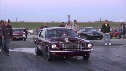 Mustang Power Wheelies Up Half Way Down The Track!