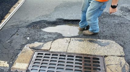 Oblivious Drivers Bottoming Out On One Huge Pothole!