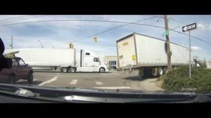 SEMI Truck Driver Takes a Right Turn a Little Too Tight… Whoops!