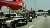 Yes, This Guy is Towing a Helicopter With His Massive Trike!