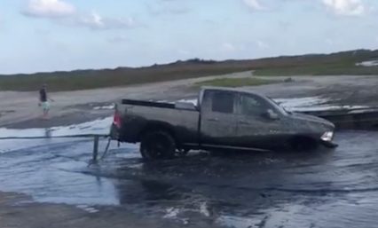 Dodge Pulled Out of Mud By Ford…. Destroys Dodge Truck!