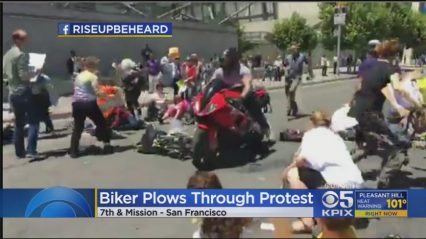 Motorcyclist Arrested For “Nearly Running Over” Protestors Laying in the Street