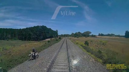 Dirtbike Rider Jumps for his Life as a High-speed Train Runs Over His Bike
