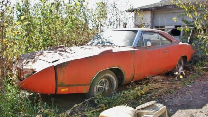 Wild Barn Find… 1969 Dodge Charger Daytona Rusting Away!