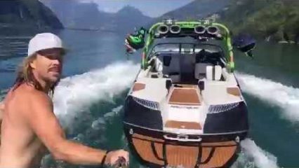 Wild Man Wakeskates Behind Boat with NO Driver