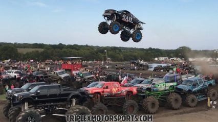 This GMC Mega Truck Goes HUGE! Jumping over 8 Mega Trucks and a Rock Bouncer!