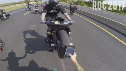 Biker On The Highway Stands Backward On Seat While Texting And Recording FB Video!