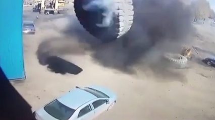 Mining Wheel Explodes, Crushes Car