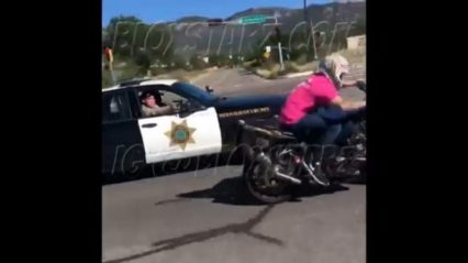 Cop Pulls Gun on Biker for Doing Wheelies on the Street!