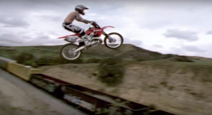 Dirtbike Rider Jumps Train Tracks to Run From the Cops, Just Like an Action Movie