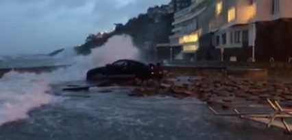 GT-R Stuck on Rocks Gets Pounded By Storm Waves…