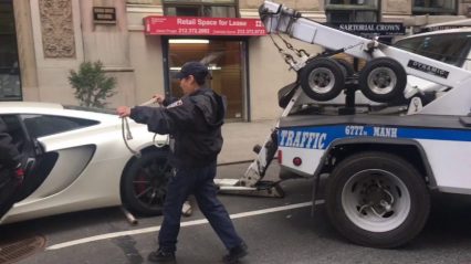 McLaren Improperly Towed by NYPD Tow Truck… Ouch!