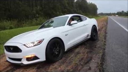 Girl In Mustang 5.0 Stuck in the Mud Just Inches Away From The Highway