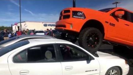 Who Can Crush Cars Better? LIFTED TITAN VS. JACKED UP RAM