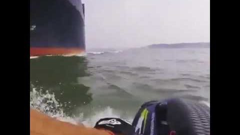 Jet Ski Rider Has Scare, Almost Sucked Under Container Ship