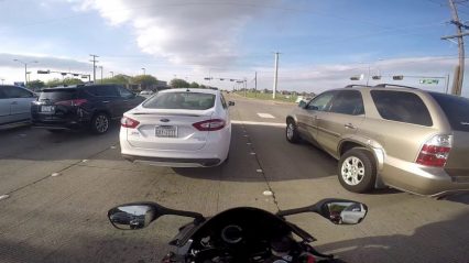 The Luckiest Motorcycle Rider in Texas, Camaro Runs T-Bones Car, Rider Hangs on to Underside