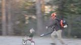 Dad Uses Backpack Blower to Propel Toddler Around on Tricycle!