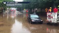 Fire Truck Rescues BMW Driver From his Car… in Less than a Foot of Water