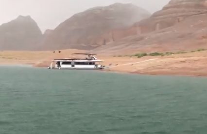 Crazy Storm Bombards Boat Out On The Lake