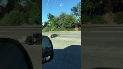 Motorcycle Rider Hits Speed Wobbles On The Highway, Goes Down Hard