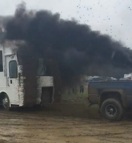 Diesel Truck Rescues Stuck RV, Covers Windshield In Mud