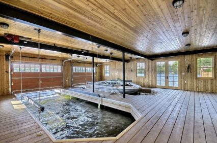 The Ultimate Boat Garage Has A Remote Control Lift