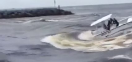 Boat Sinks Half Way In Rough Inlet, Driver Makes Miraculous Recovery