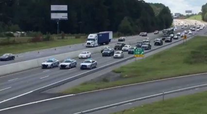 South Carolina Troopers Lead Traffic Backwards On Interstate In Florence Evacuation Effort
