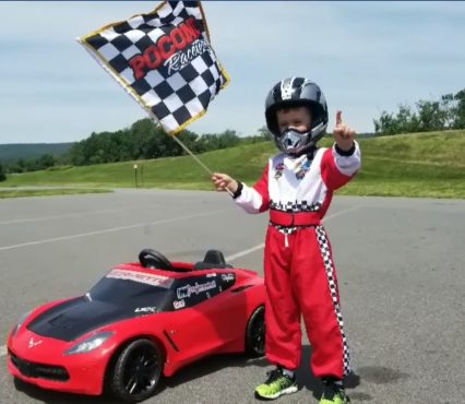 Kid Does Burnout While Driving Power Wheels Corvette
