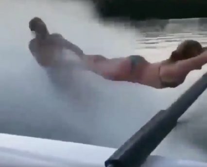 Wakeboarding Done Right! Guy Uses Woman As Tow Strap!