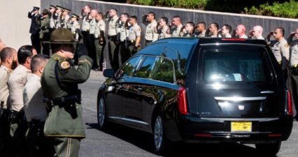 Civilians and Police Line the 101 Freeway to Honor Fallen Sergeant
