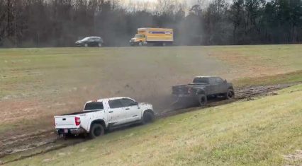 Ford Dually Throttles Down, Makes Huge Muddy Mess Pulling Out Stuck Tundra