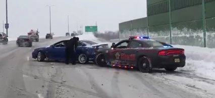 GTO Couldn’t Get Traction In The Snow, Cop With A Ram Bar Came To The Rescue