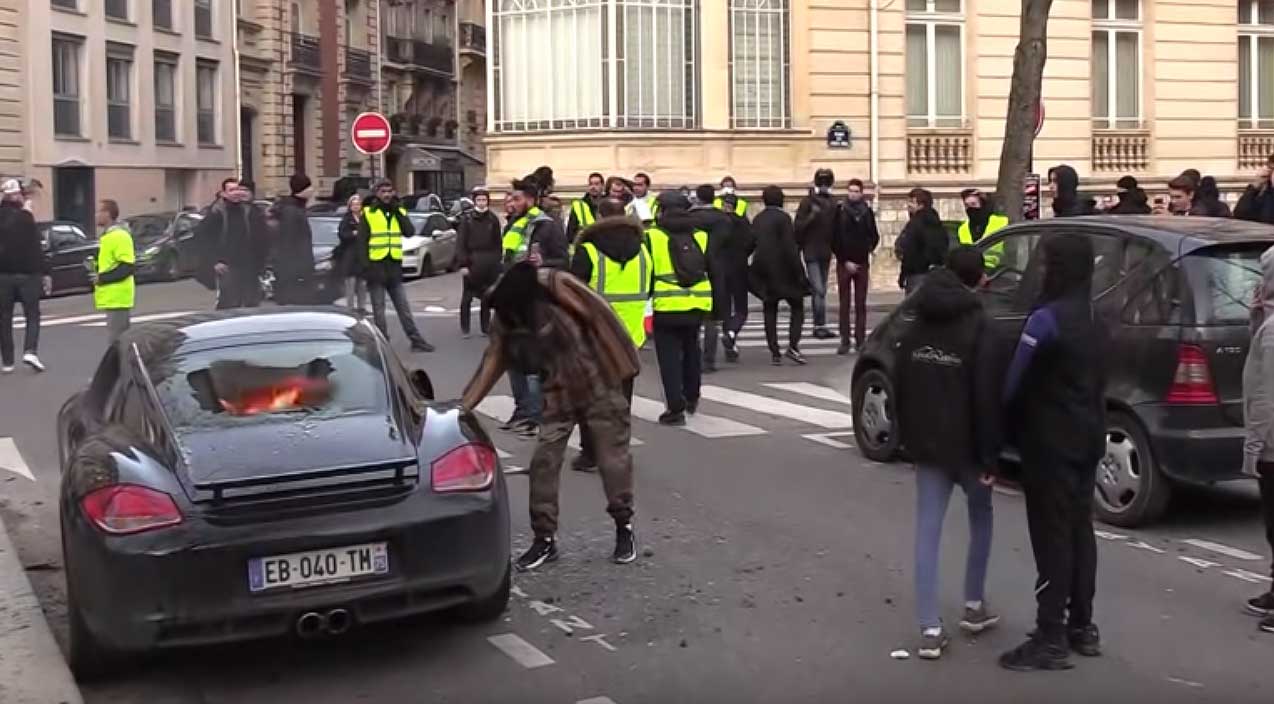Porsche & Ferrari vandalized, set ablaze during Yellow Vest protests in Paris