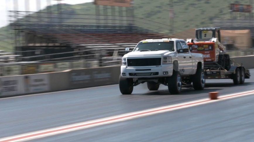 Diesel Trucks Drag Race While Pulling Trailers