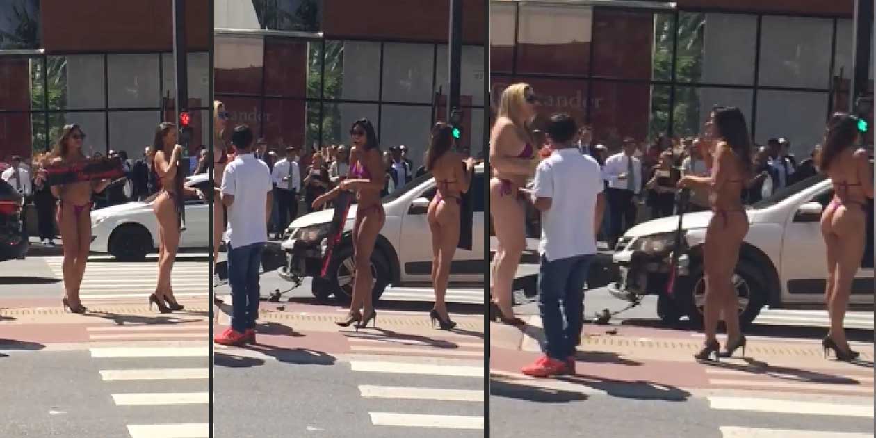 Bikini Clad Woman Holding a Sign Causes a Crash, Talk About Awkward