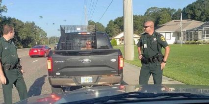 Polk County Woman Pulled Over For Dog Cage With Man in the Bed of Pickup